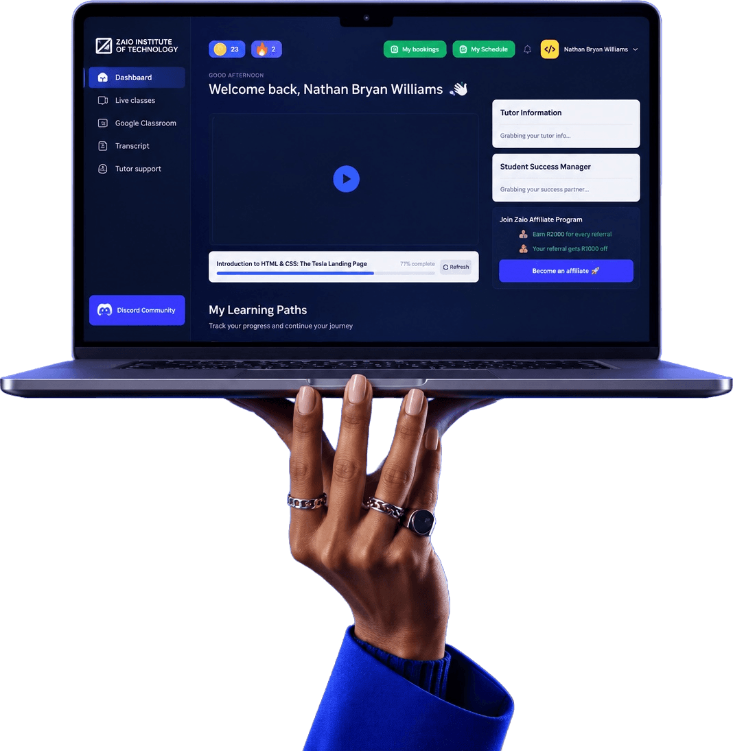 A hand holding up a laptop showing the Zaio learning platform